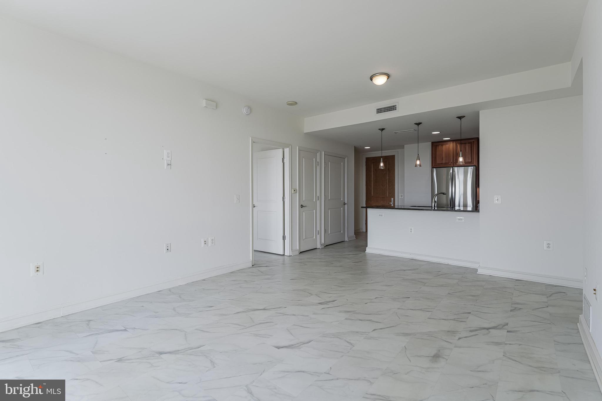 11990 Market Street, Unit 1414 Reston, VA 20190 - Photo 6 of 65 a view of an empty room