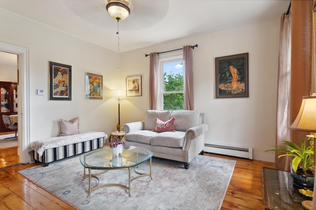 7 Spring Street Spencer, MA 01562 - Photo 11 of 38 a living room with furniture and wooden floor
