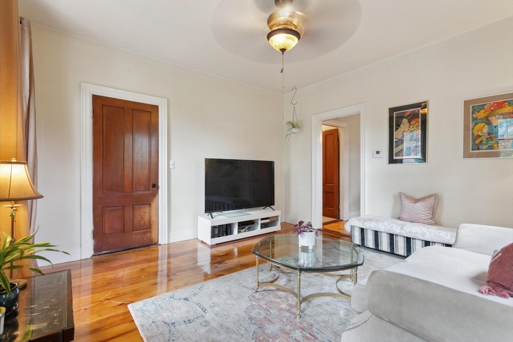 7 Spring Street Spencer, MA 01562 - Photo 12 of 38 a living room with furniture and a flat screen tv