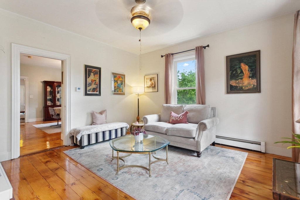 7 Spring Street Spencer, MA 01562 - Photo 13 of 38 a living room with furniture and a window