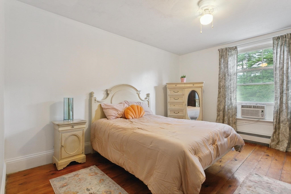 7 Spring Street Spencer, MA 01562 - Photo 16 of 38 a bedroom with a bed and a window