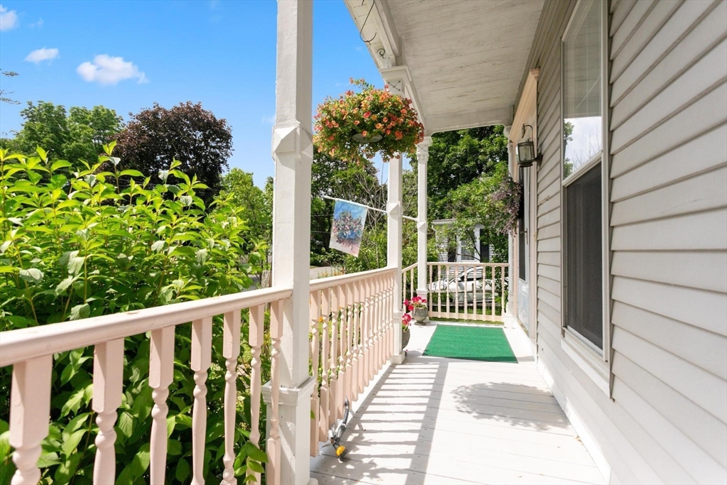 7 Spring Street Spencer, MA 01562 - Photo 28 of 38 a view of a pathway of a house with a flower garden