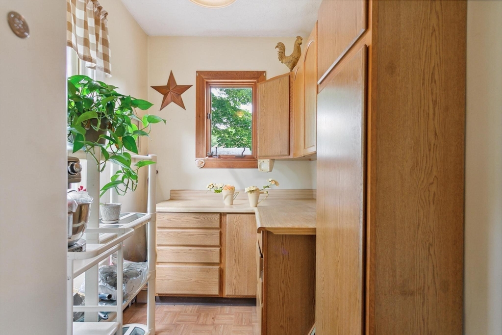 7 Spring Street Spencer, MA 01562 - Photo 5 of 38 a kitchen with a refrigerator and a sink