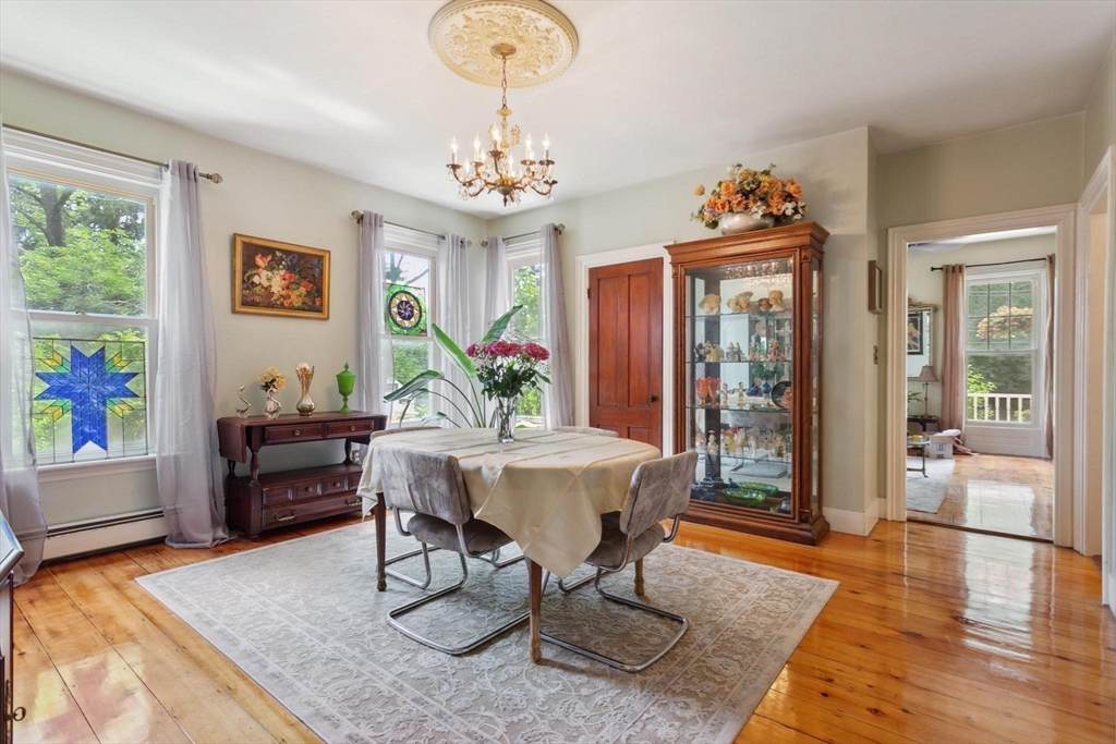 7 Spring Street Spencer, MA 01562 - Photo 6 of 38 a view of a dining room with furniture window and wooden floor