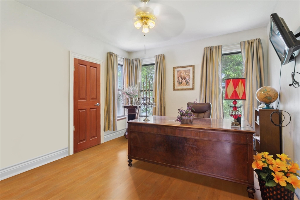 7 Spring Street Spencer, MA 01562 - Photo 8 of 38 a living room with furniture and painting on the wall