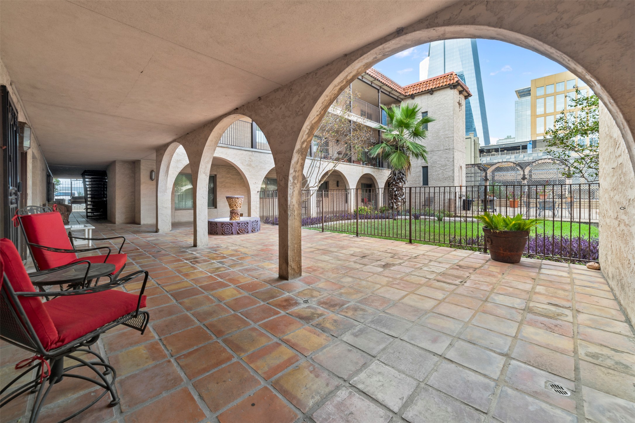 505 West 7th Street, Unit 113 Austin, TX 78701 - Photo 21 of 26 a view of a house with backyard porch and sitting area