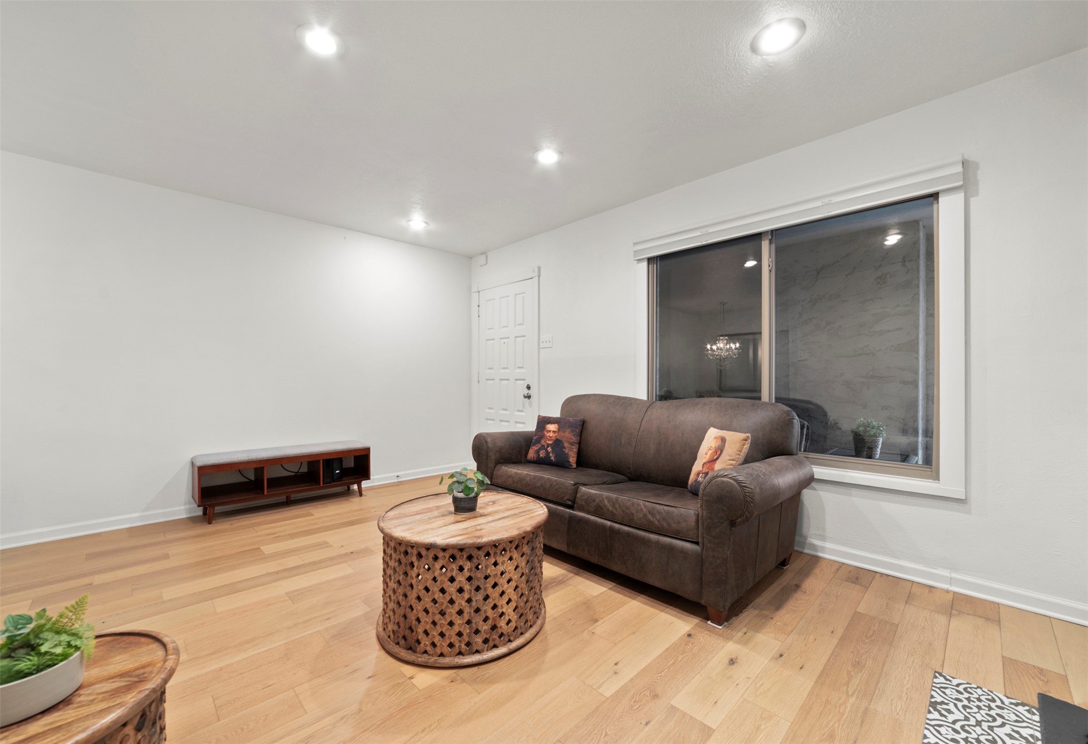 505 West 7th Street, Unit 113 Austin, TX 78701 - Photo 8 of 26 a living room with furniture and a rug