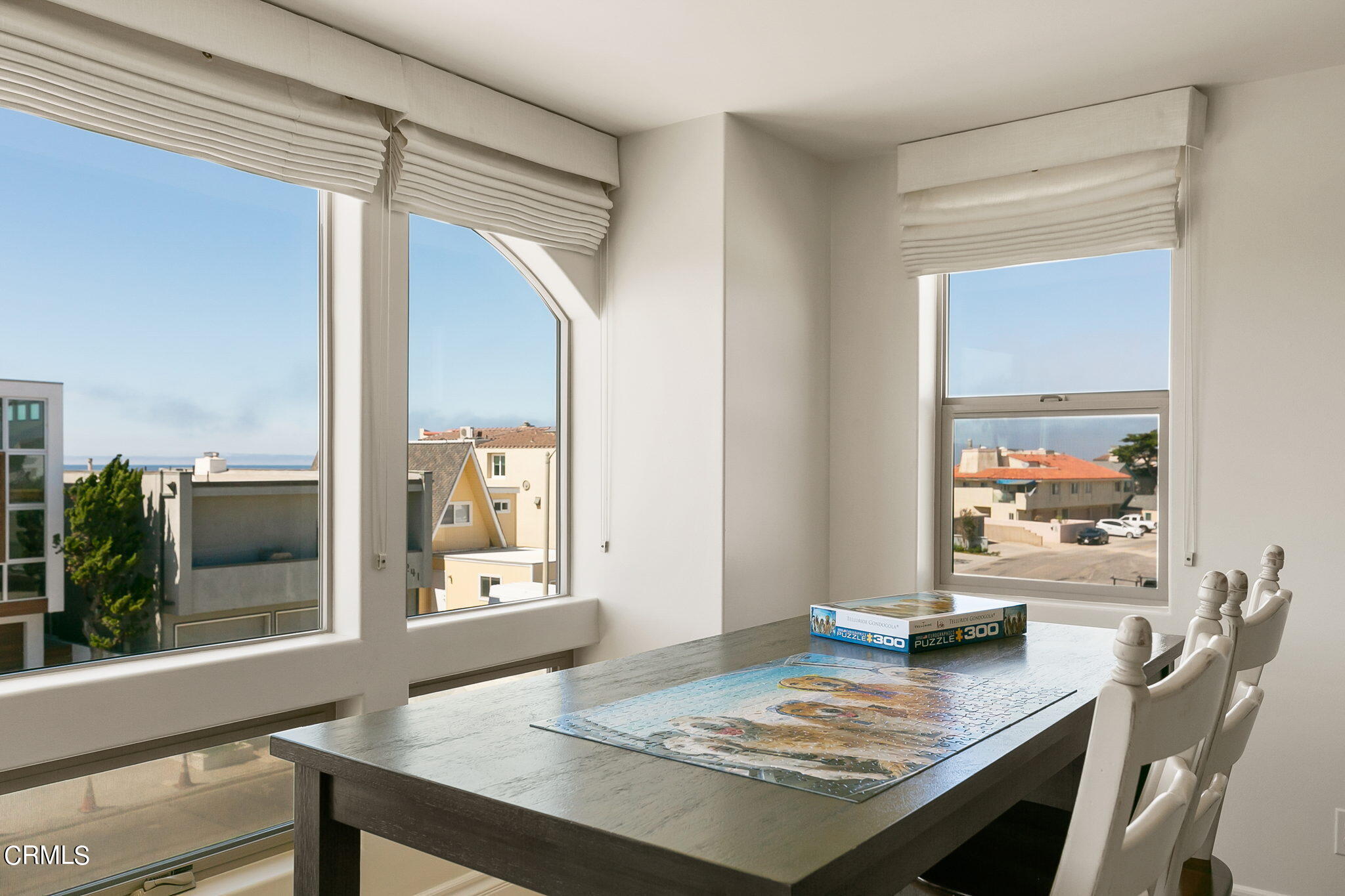3224 Ocean Drive Oxnard, CA 93035 - Photo 12 of 52 a view of a dining table and chairs in the kitchen