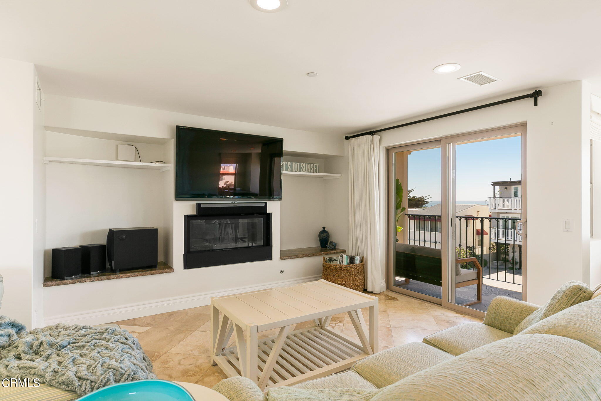 3224 Ocean Drive Oxnard, CA 93035 - Photo 13 of 52 a living room with furniture and a flat screen tv