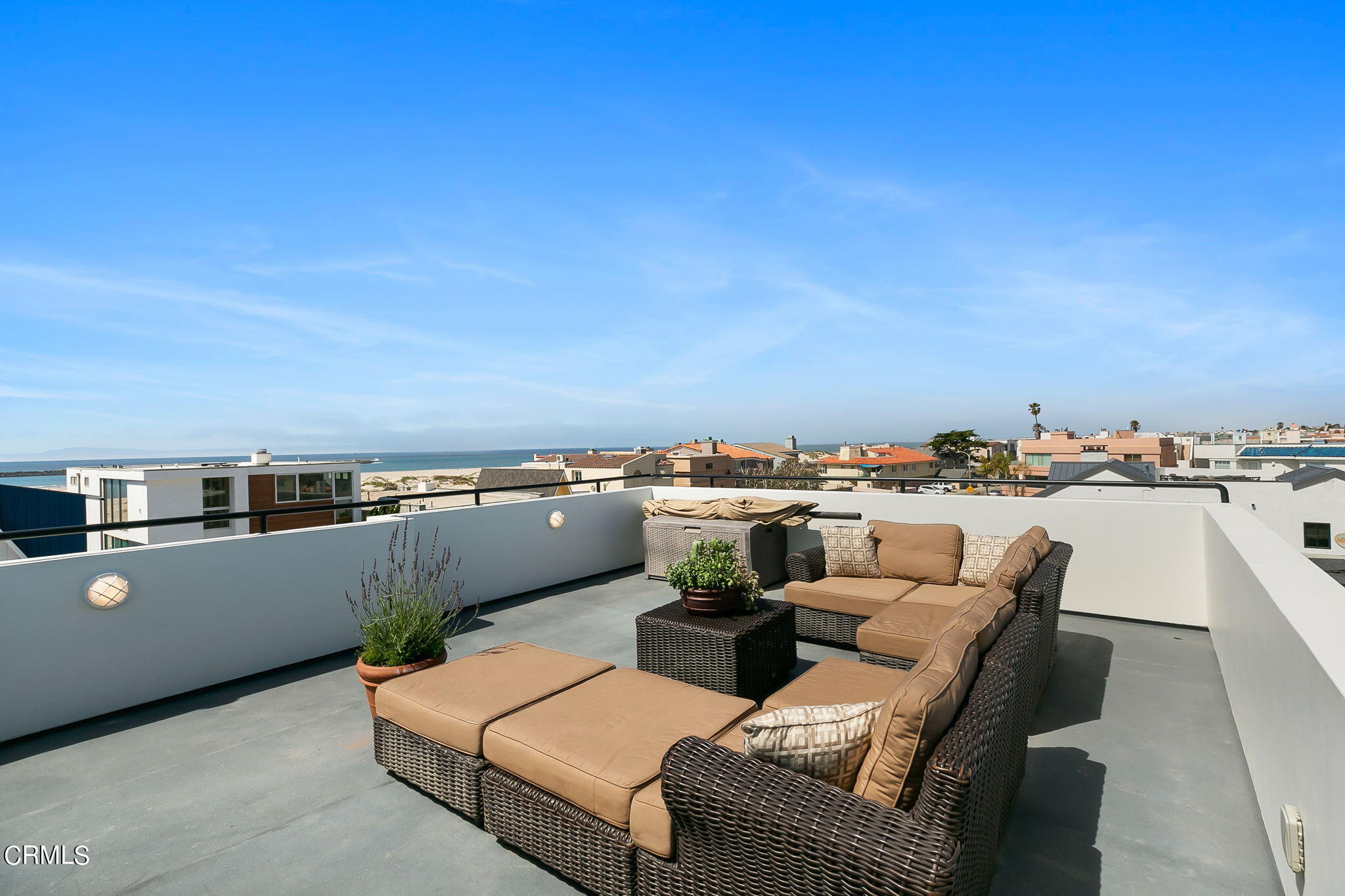 3224 Ocean Drive Oxnard, CA 93035 - Photo 19 of 52 a view of a terrace with furniture and a city view