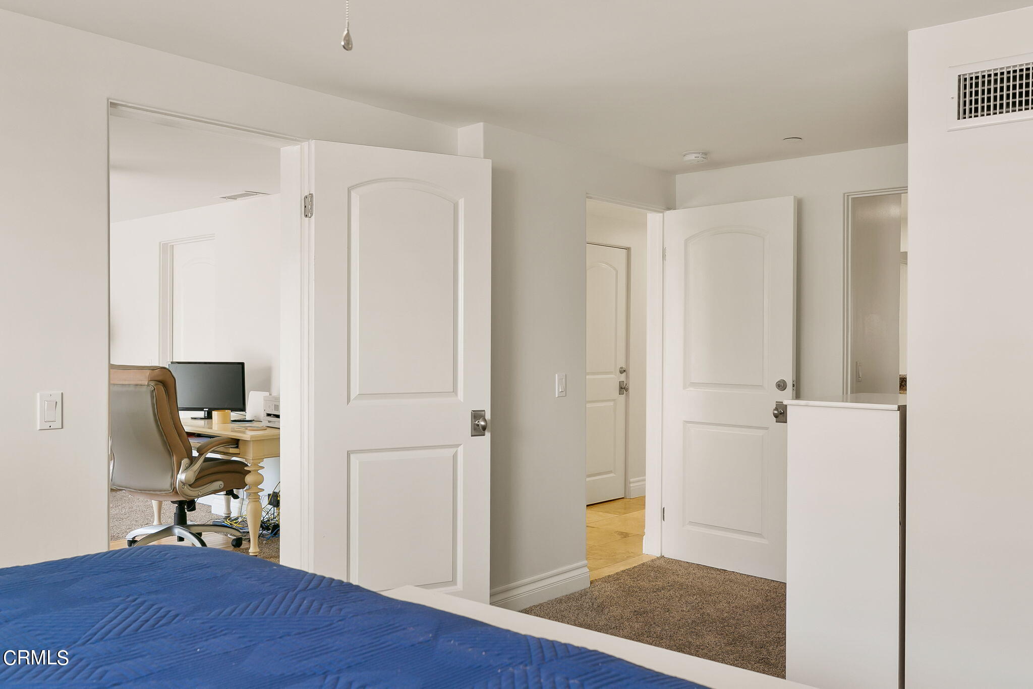 3224 Ocean Drive Oxnard, CA 93035 - Photo 34 of 52 a view of a workspace with wooden floor and bathroom view