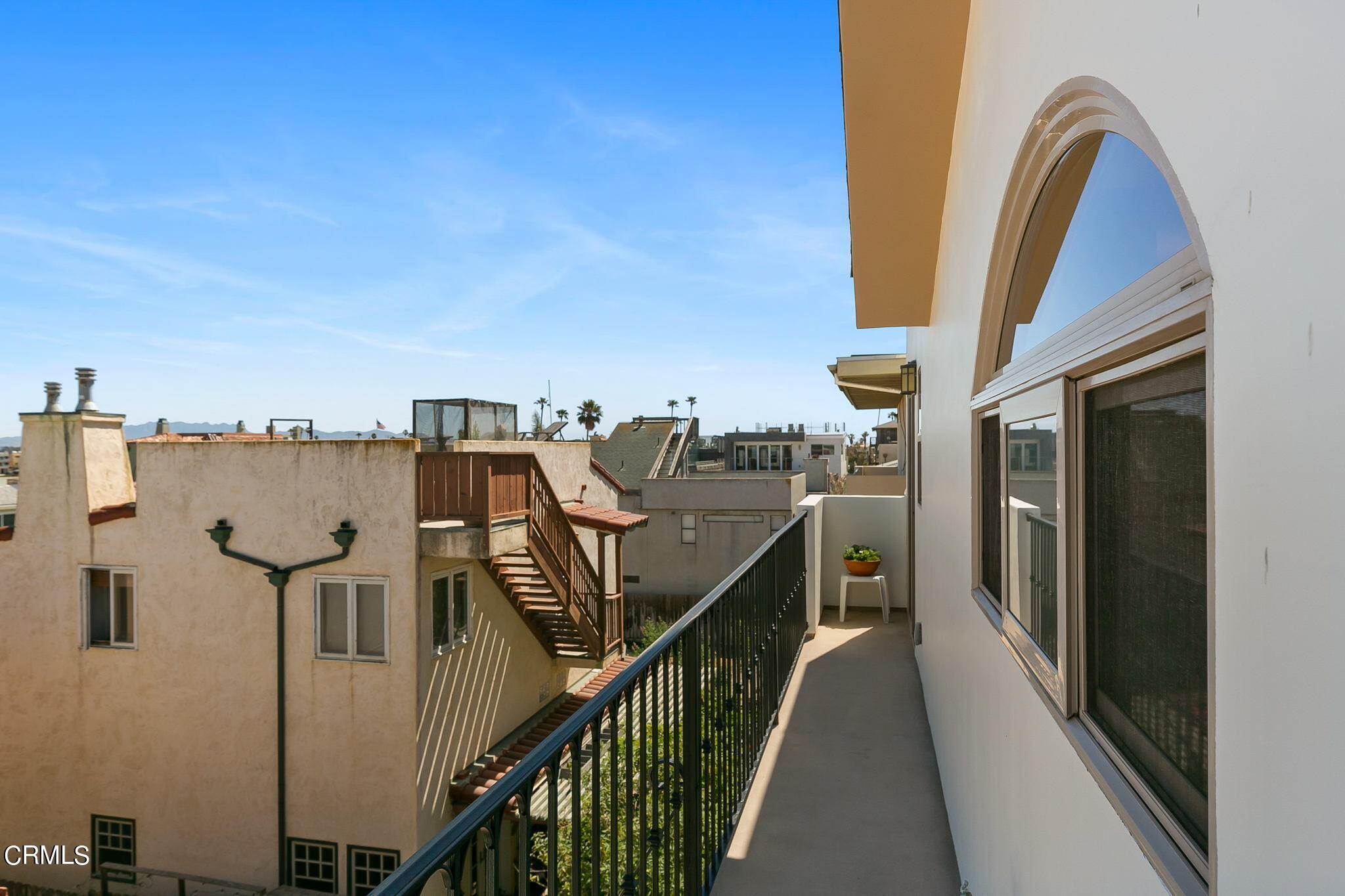 3224 Ocean Drive Oxnard, CA 93035 - Photo 42 of 52 a view of a balcony with chairs