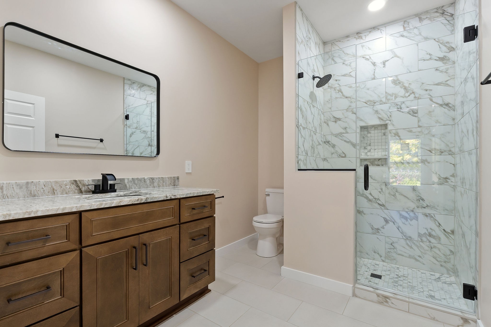 599 Hutchins Bend Road Smithville, TN 37166 - Photo 12 of 36 a bathroom with a granite countertop sink a toilet and a mirror