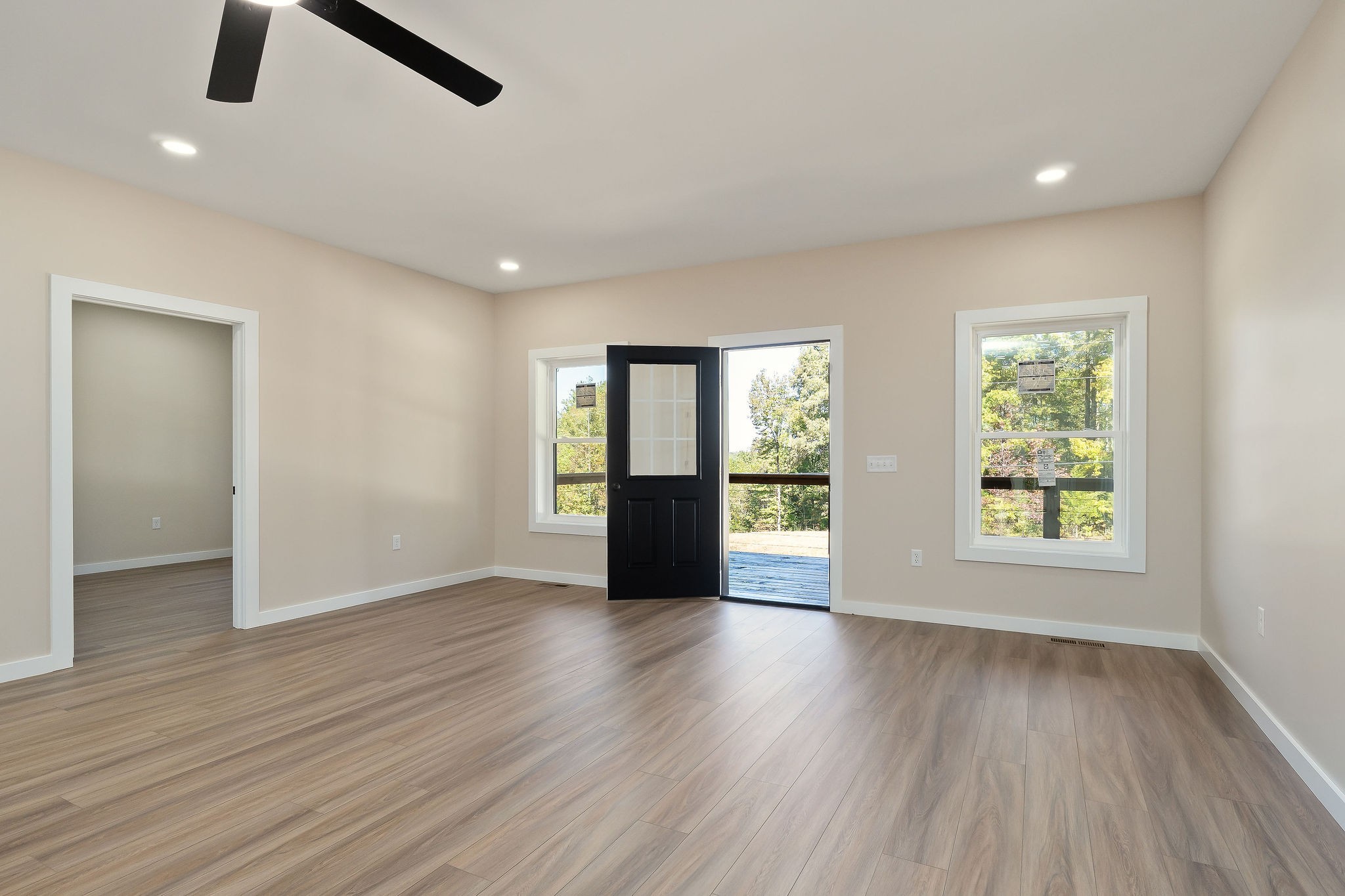 599 Hutchins Bend Road Smithville, TN 37166 - Photo 28 of 36 wooden floor in an empty room with a window