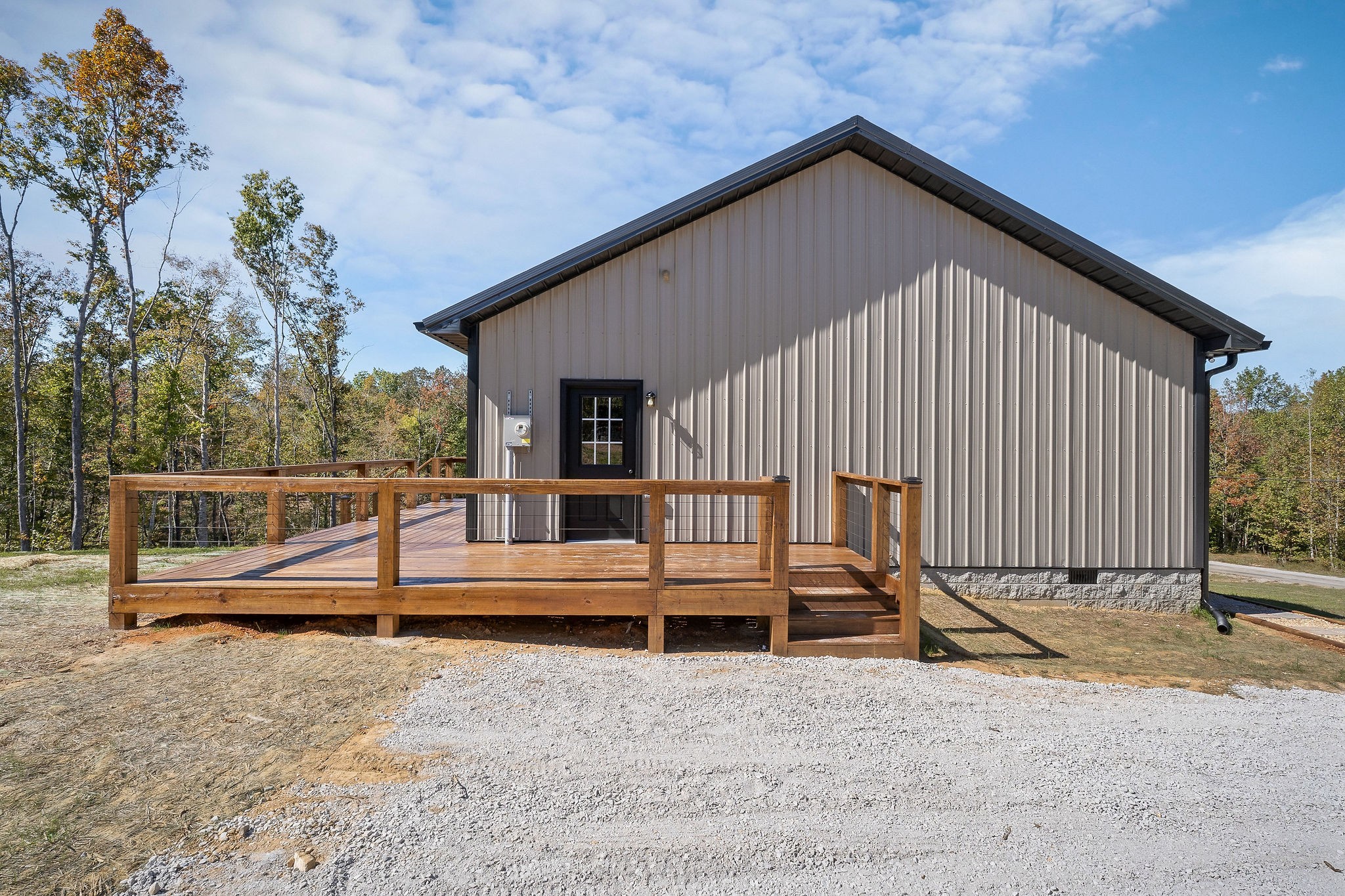 599 Hutchins Bend Road Smithville, TN 37166 - Photo 29 of 36 a view of backyard with deck and wooden fence