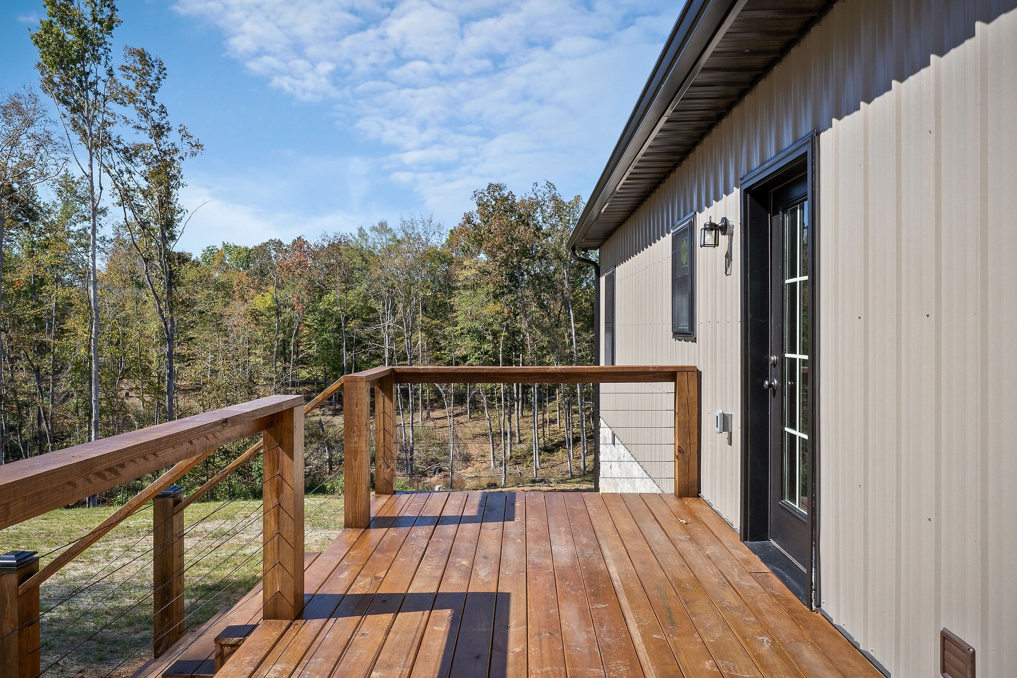 599 Hutchins Bend Road Smithville, TN 37166 - Photo 32 of 36 a view of balcony with wooden floor and fence