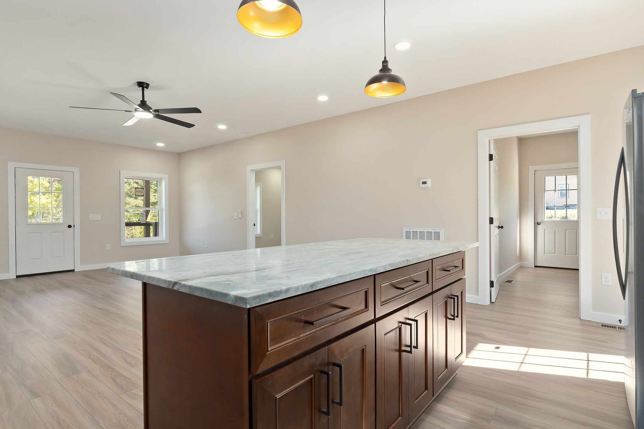 599 Hutchins Bend Road Smithville, TN 37166 - Photo 35 of 36 a kitchen that has a lot of cabinets in it