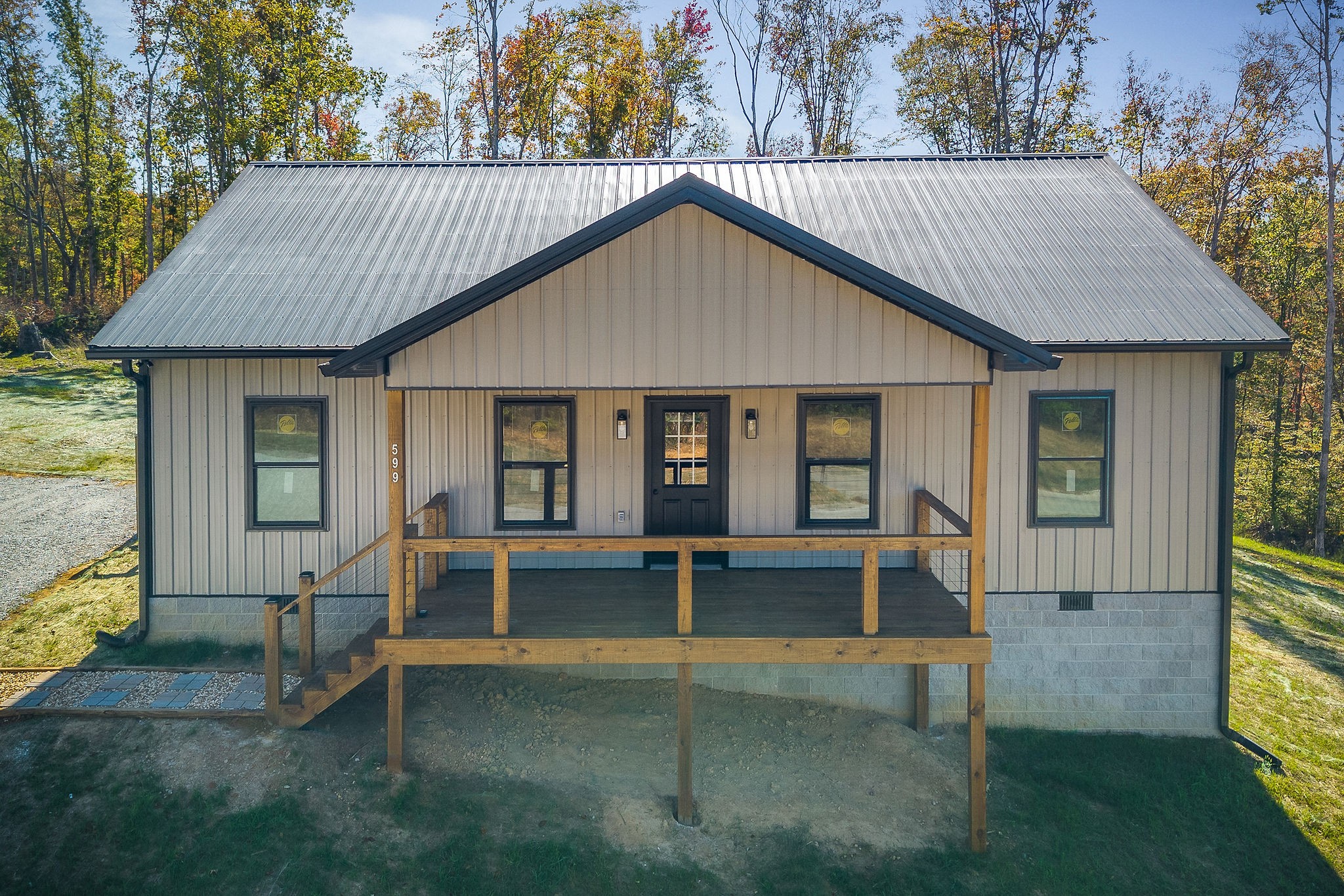 599 Hutchins Bend Road Smithville, TN 37166 - Photo 5 of 36 a view of house with backyard space and balcony