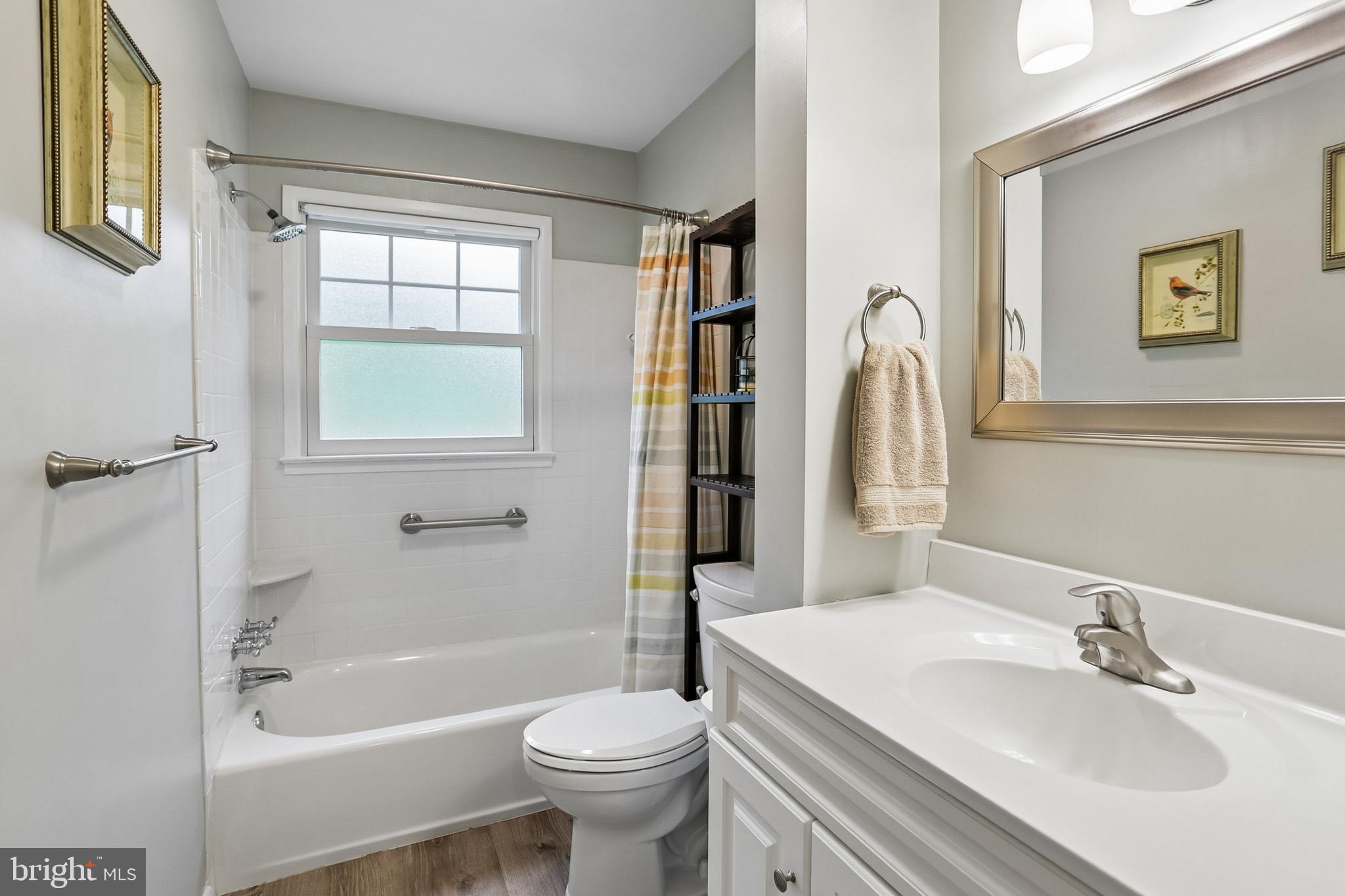 2003 Rampart Drive Alexandria, VA 22308 - Photo 22 of 38 a bathroom with a sink a toilet and shower