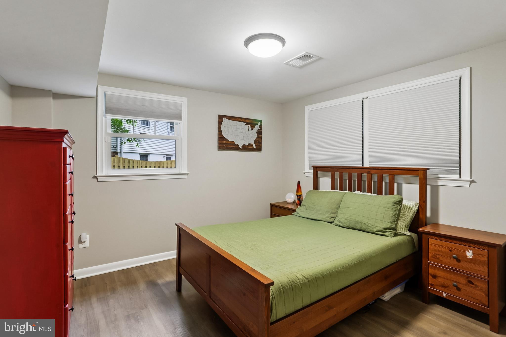 2003 Rampart Drive Alexandria, VA 22308 - Photo 28 of 38 a bedroom with a bed and a night stand