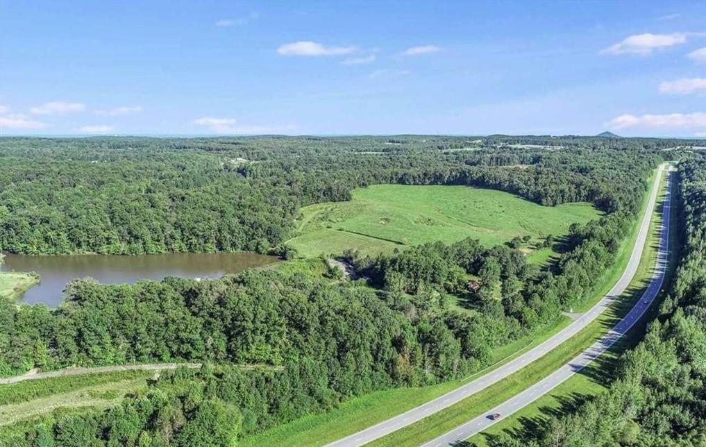 1340 441 Express Way Mount Mount Airy, GA 30563 - Photo 12 of 25 a view of a green field with lots of green space