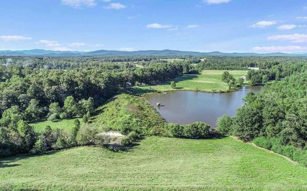 1340 441 Express Way Mount Mount Airy, GA 30563 - Photo 16 of 25 a view of a lake with a city