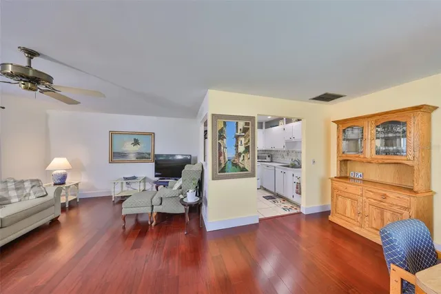 a kitchen with a sink cabinets and stainless steel appliances