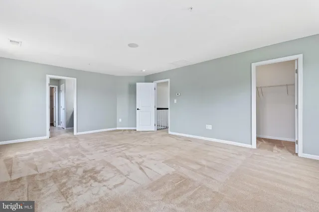 a view of a room with racks on the wall