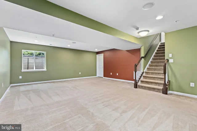 a view of a room with wooden walls