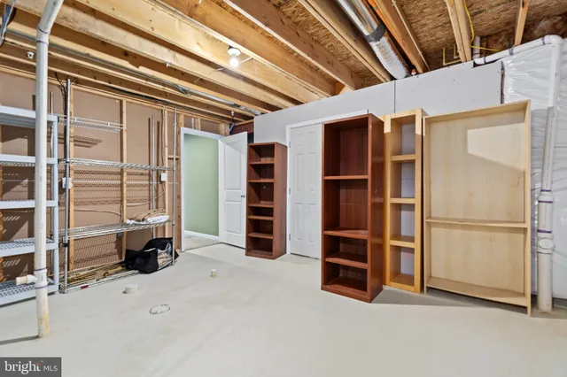 a view of a garden with an outdoor seating