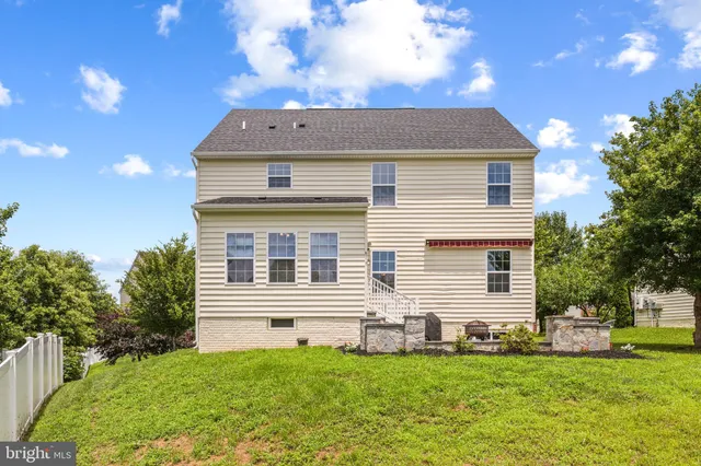 a view of a room with wooden walls