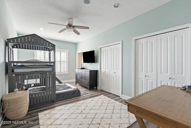 a view of an outside dining space with furniture