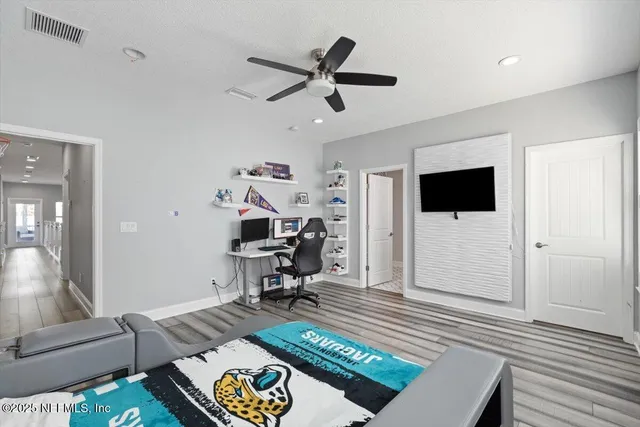 a view of a house with backyard porch and sitting area