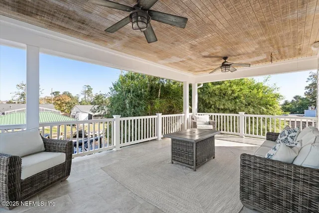 a view of a swimming pool with a lounge chairs