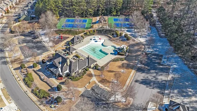 a view of multiple houses with outdoor space
