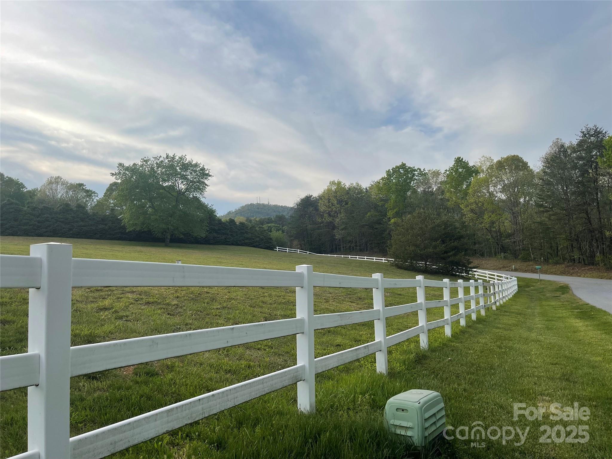 6161 Willowbottom Road Hickory, NC 28602 - Photo 5 of 8 a view of a wooden fence with a big yard