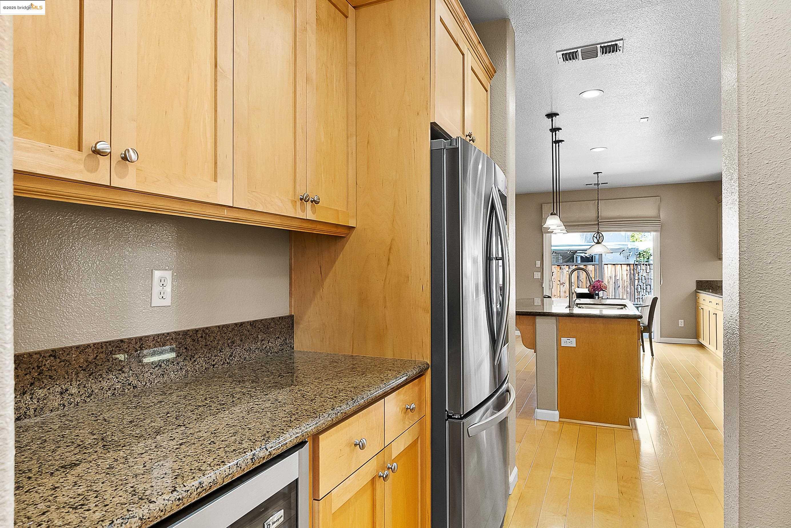 5282 Fern Ridge Circle Discovery Bay, CA 94505 - Photo 14 of 41 a kitchen with stainless steel appliances granite countertop a refrigerator and a sink