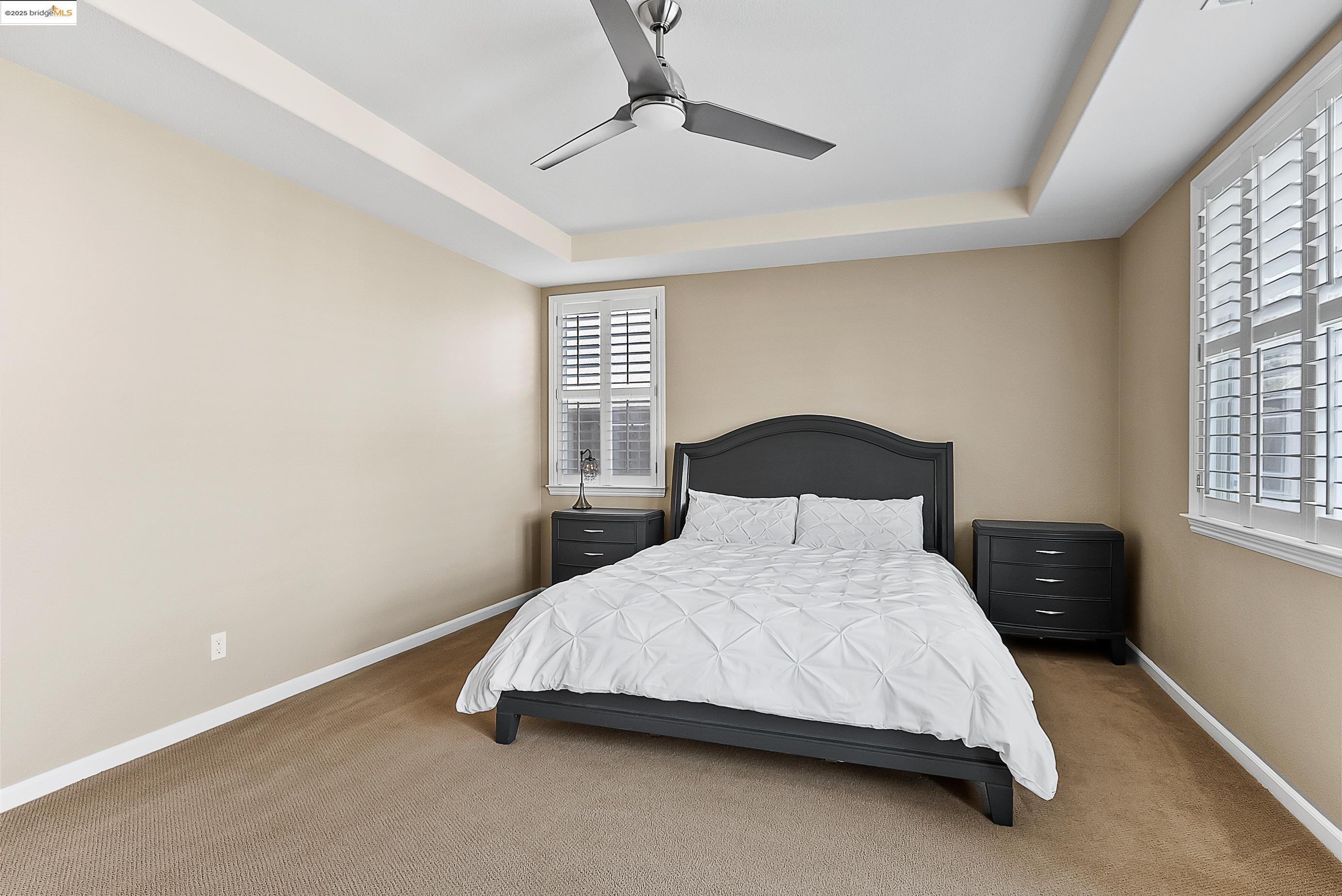 5282 Fern Ridge Circle Discovery Bay, CA 94505 - Photo 16 of 41 a bedroom with a bed and a window