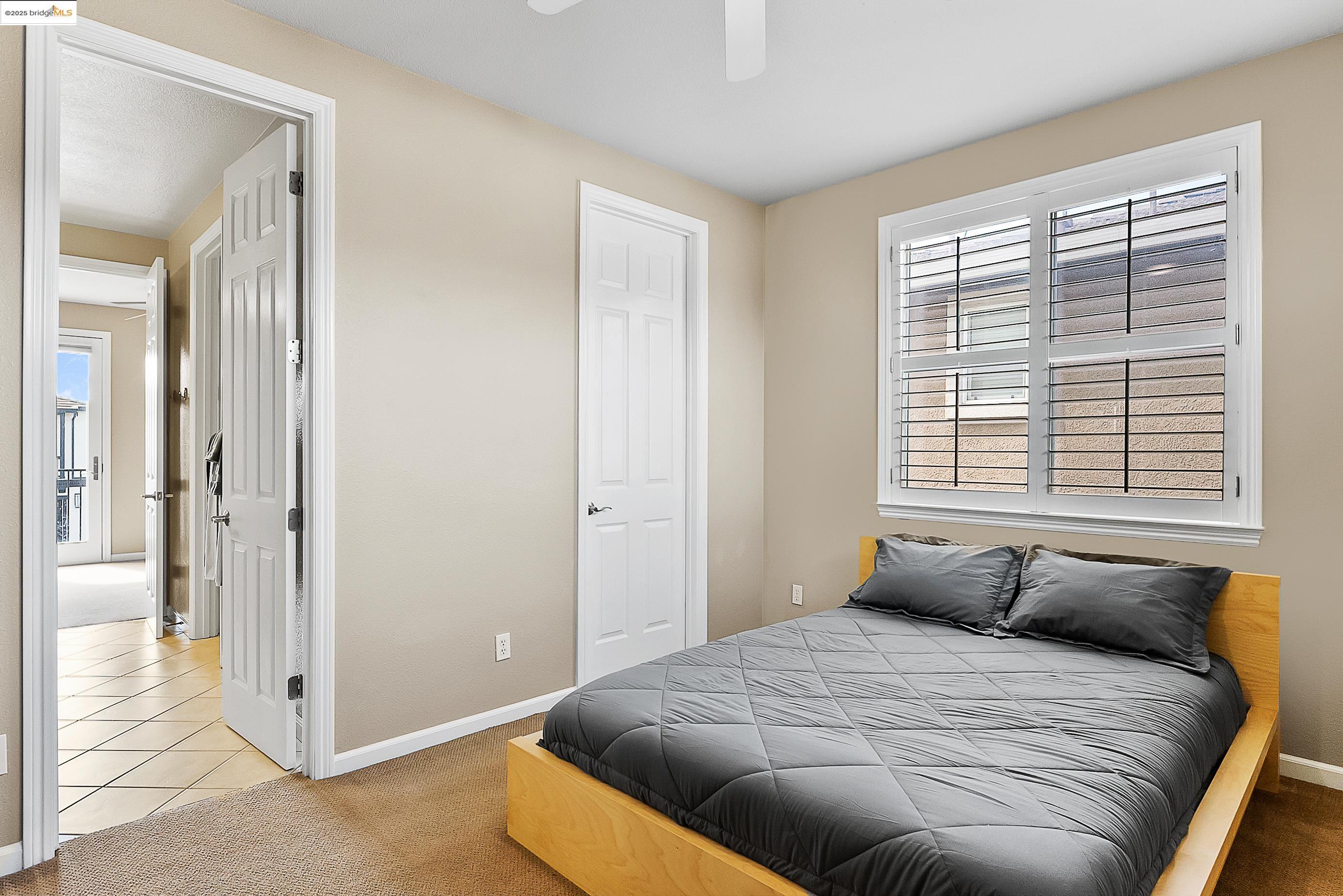 5282 Fern Ridge Circle Discovery Bay, CA 94505 - Photo 30 of 41 a bedroom with a bed and a window