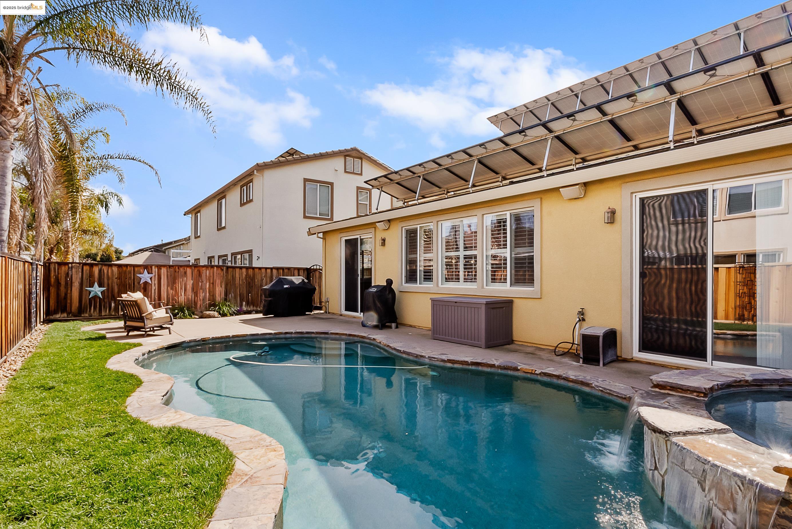 5282 Fern Ridge Circle Discovery Bay, CA 94505 - Photo 33 of 41 a view of a house with swimming pool and sitting area