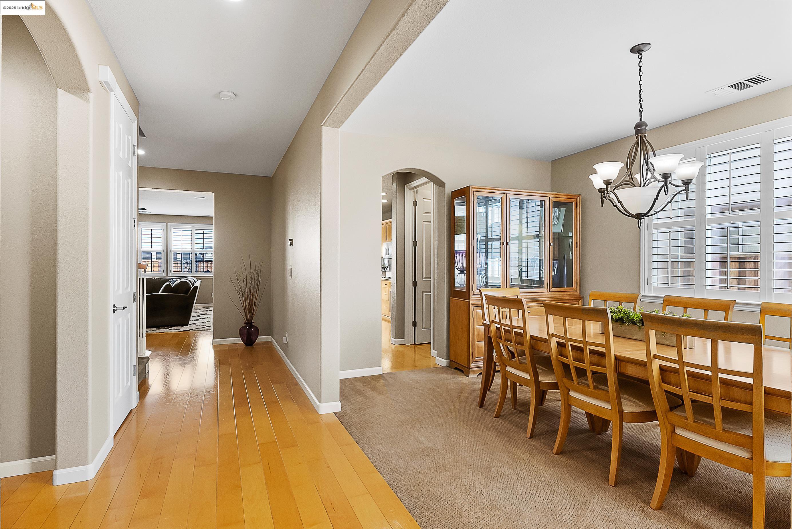5282 Fern Ridge Circle Discovery Bay, CA 94505 - Photo 5 of 41 a view of a dining room with furniture and wooden floor
