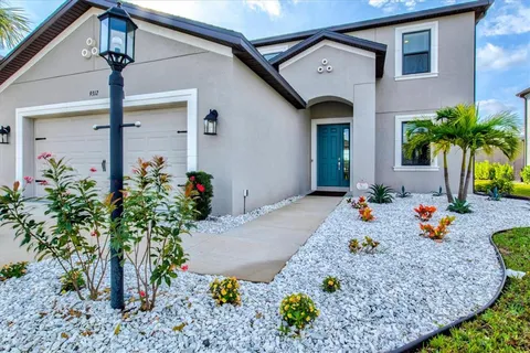 a front view of a house with patio