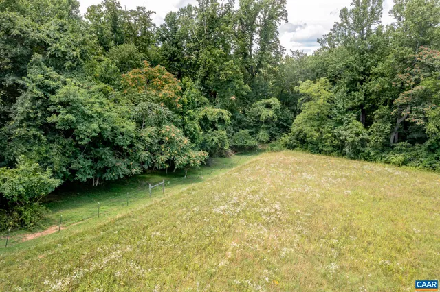 a view of a yard with an outdoor space