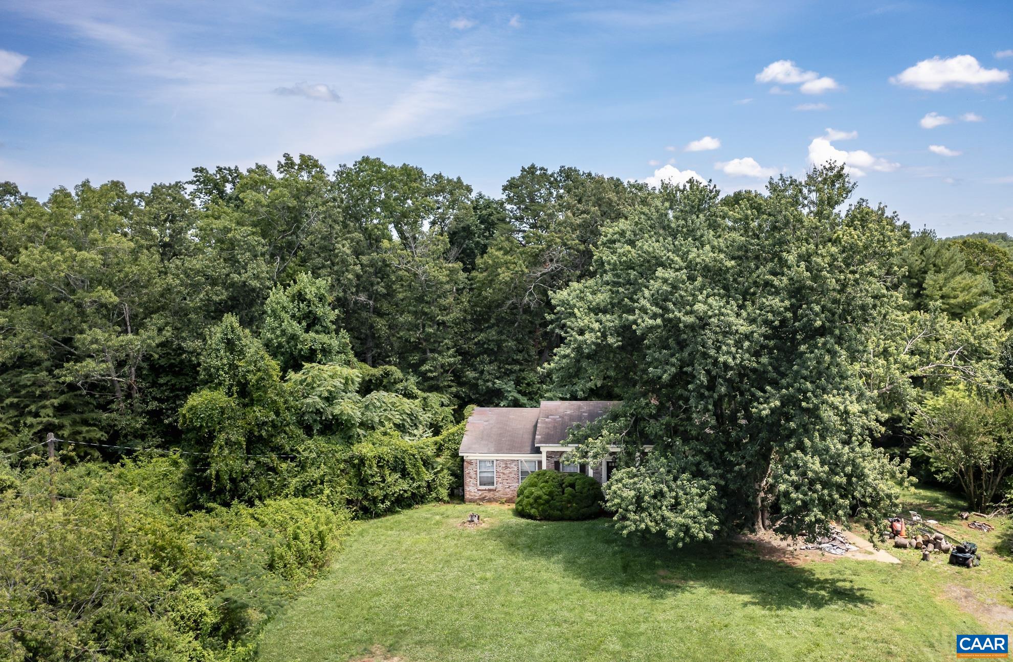 11697 Spotswood Trail Ruckersville, VA 22968 - Photo 29 of 53 an aerial view of a house with a yard