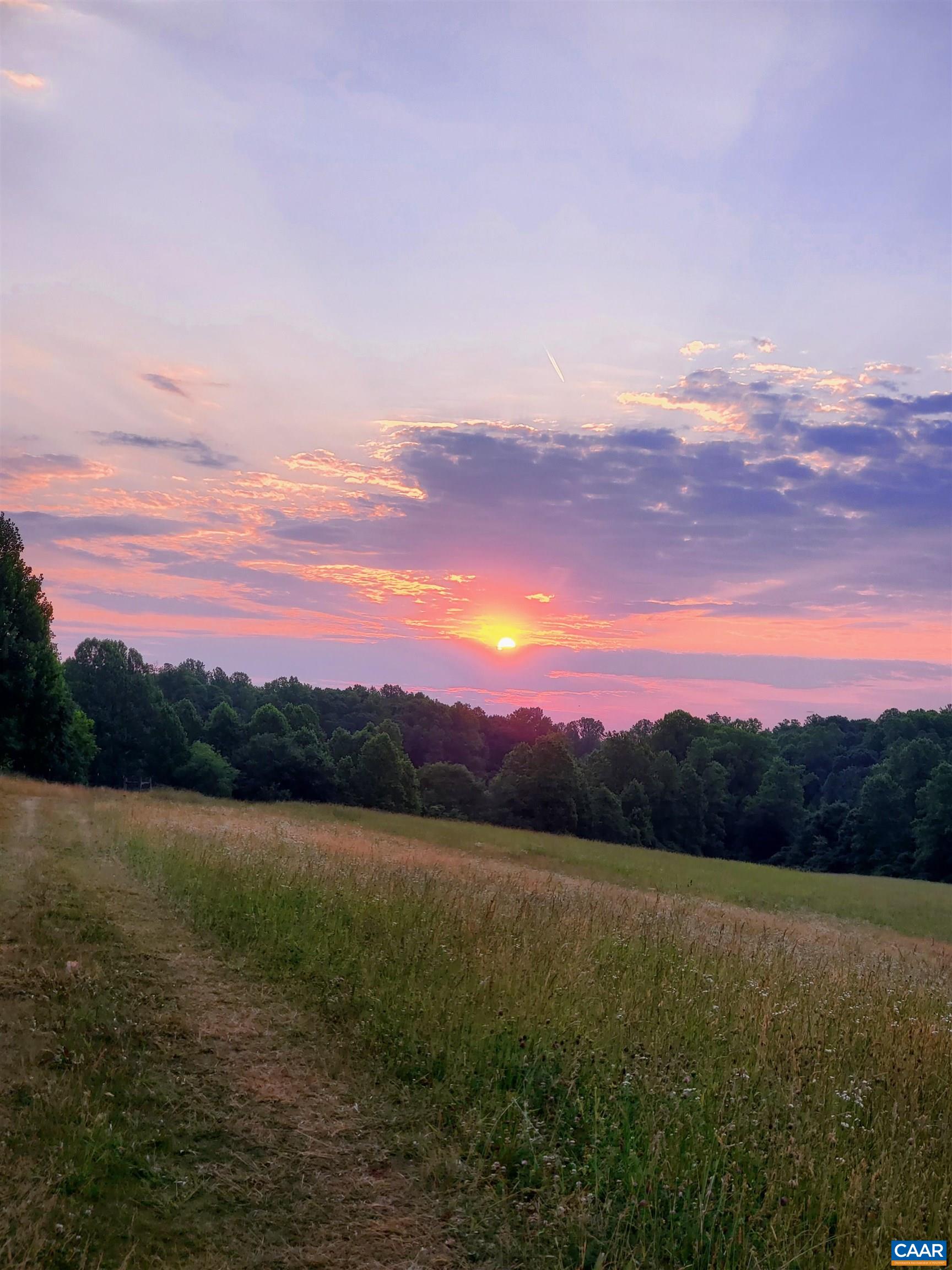 11697 Spotswood Trail Ruckersville, VA 22968 - Photo 34 of 53 a view of lake and mountain