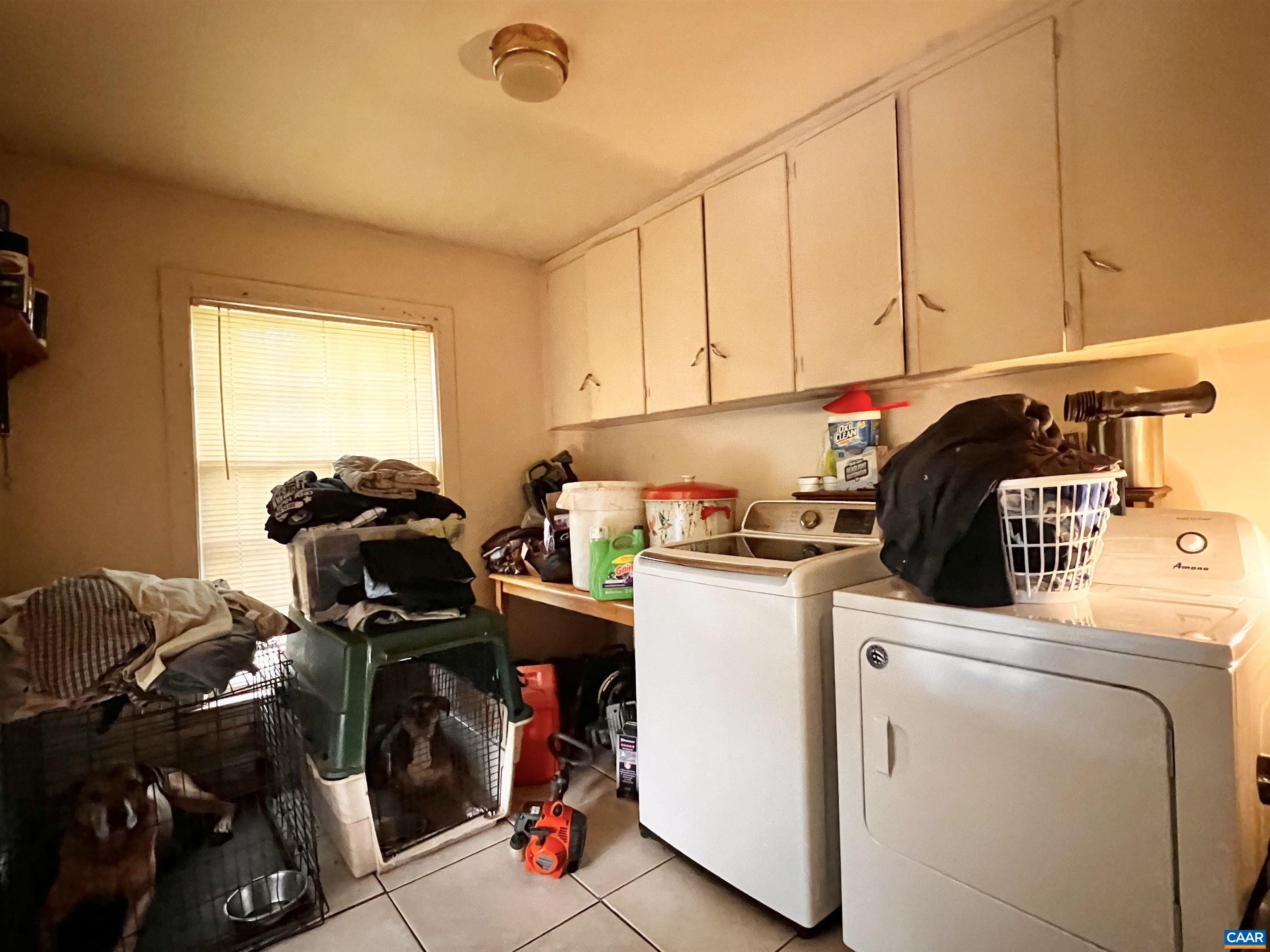 11697 Spotswood Trail Ruckersville, VA 22968 - Photo 40 of 53 a view of a storage & utility room with washer and dryer
