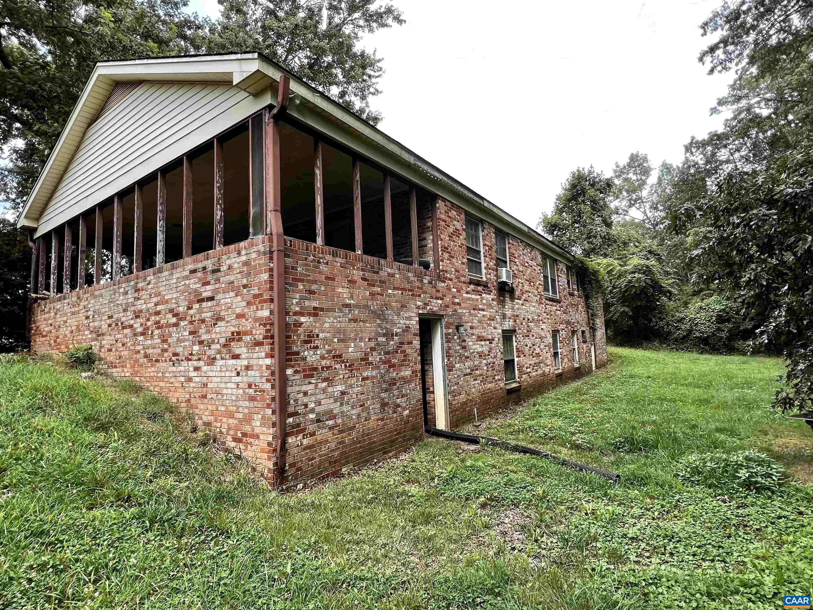11697 Spotswood Trail Ruckersville, VA 22968 - Photo 43 of 53 a view of a house with a yard