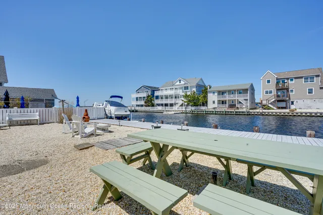a swimming pool view with a lake view