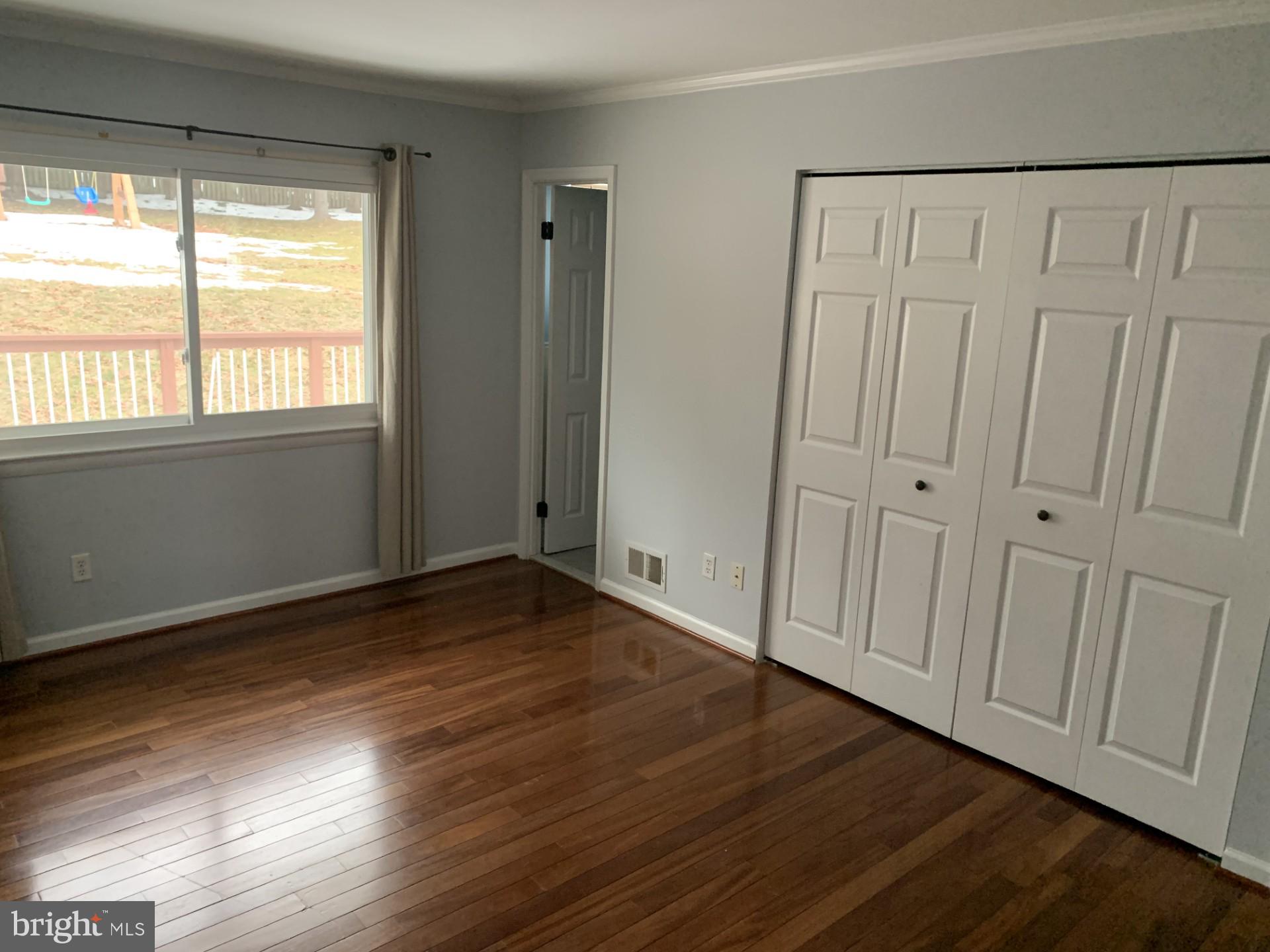 7004 Fitzpatrick Drive Laurel, MD 20707 - Photo 16 of 35 a view of a livingroom with wooden floor