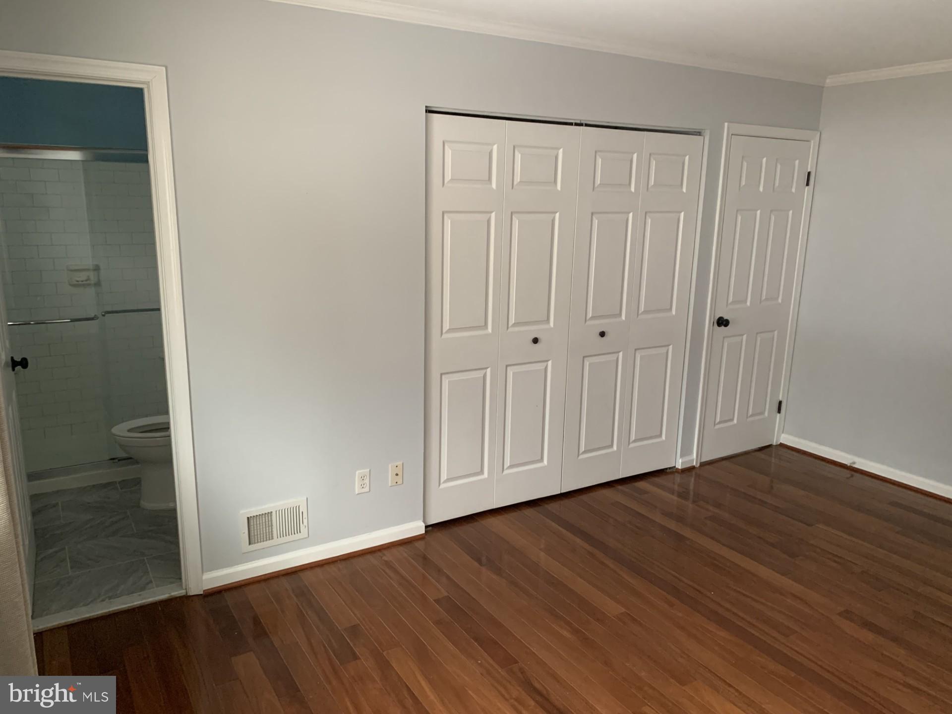7004 Fitzpatrick Drive Laurel, MD 20707 - Photo 17 of 35 a view of an empty room with wooden floor